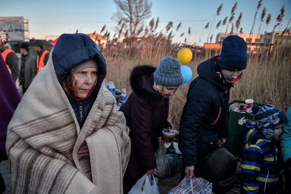 Refugiados ucranianos en la frontera con Polonia by Louisa GOULIAMAKI AFP (Télam)