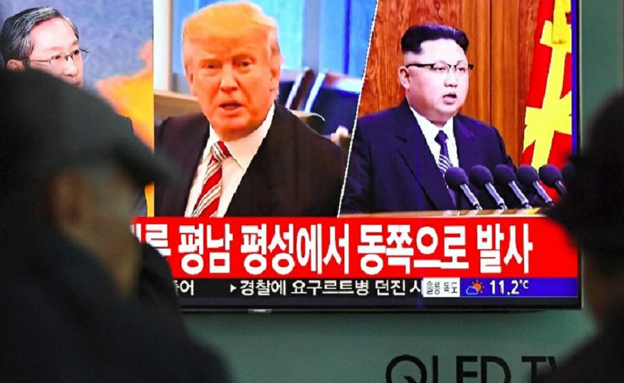 trump kim jong by AFP