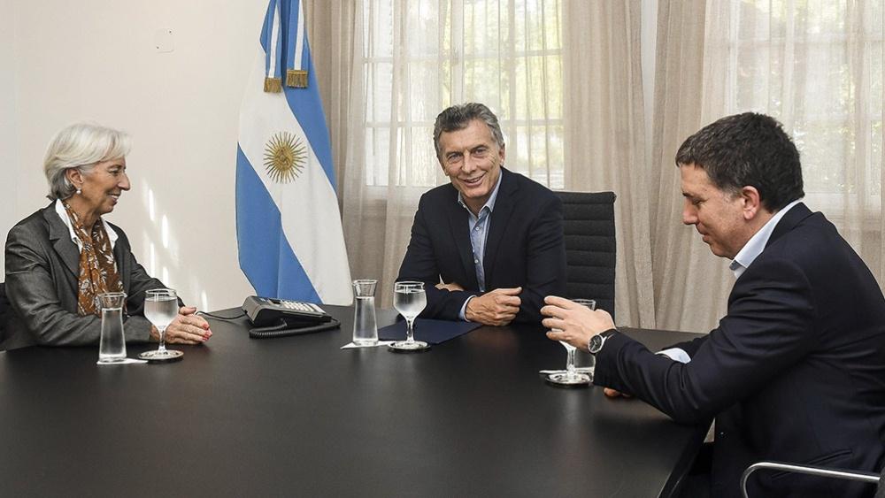 Macri, Lagarde y Caputo by Télam